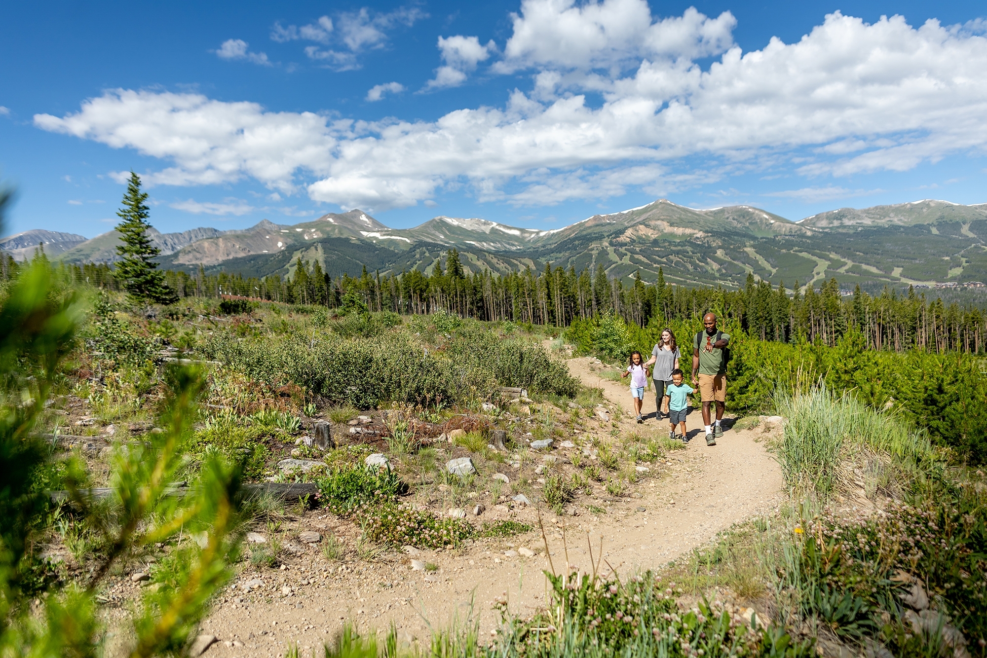 family hiking in breck