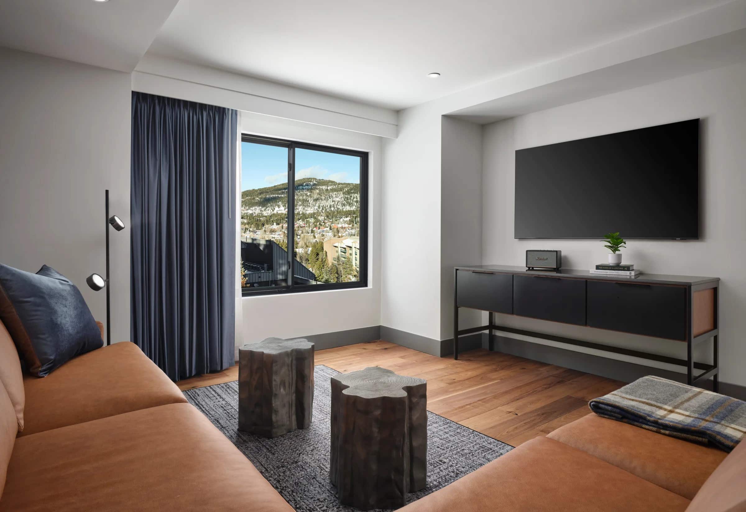 Hotel Alpenrock one-bedroom suite living room with mountain views