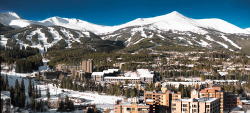 Alpenrock Hotel exterior and mountain range in Breckenridge